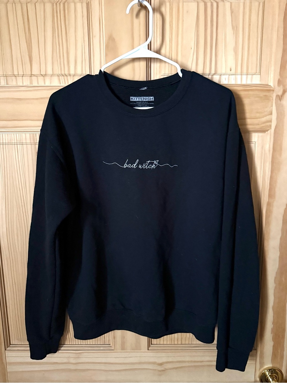 Kittenish Black Crewneck Sweatshirt with 'bad witch' Script